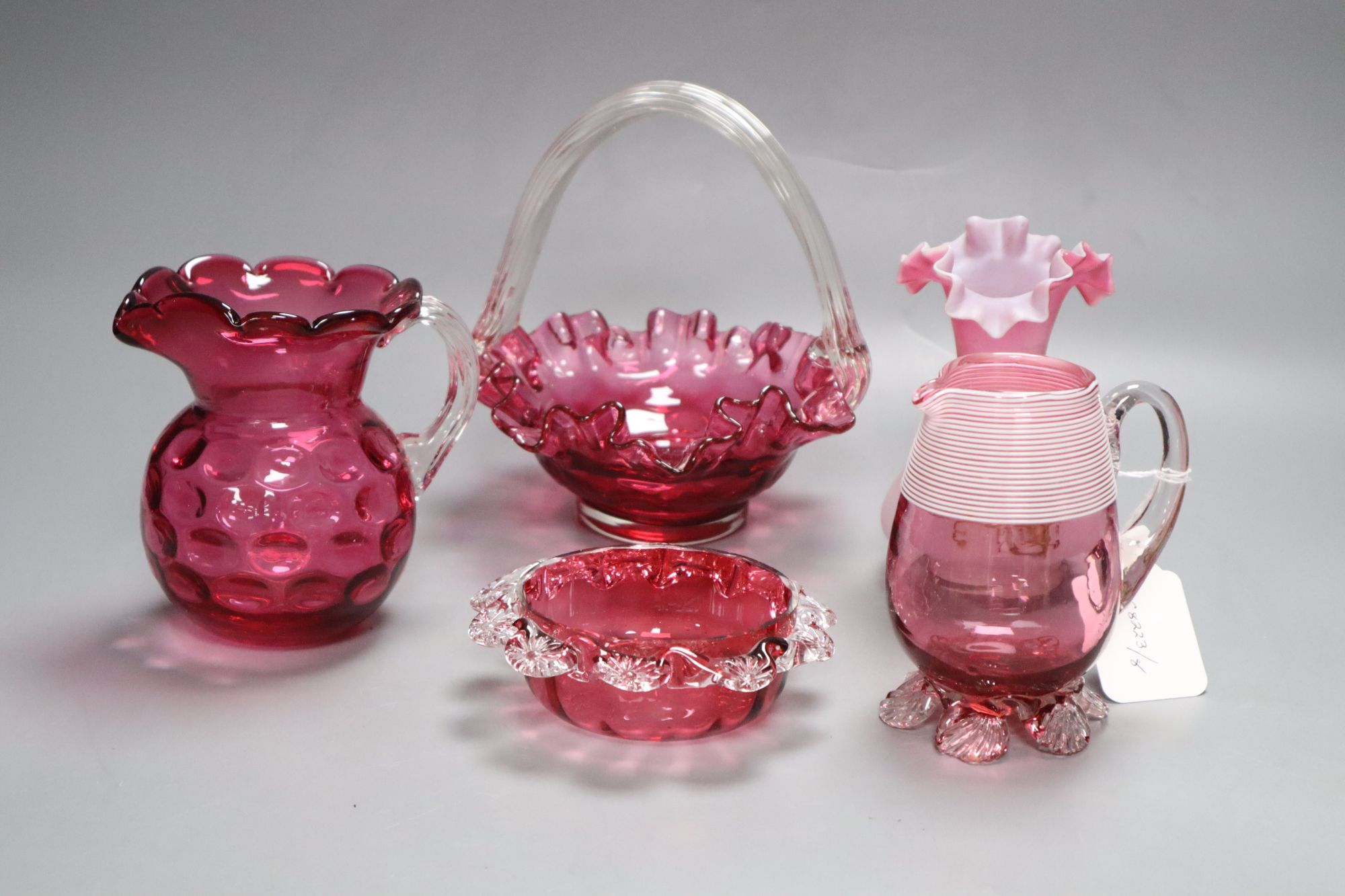 A quantity of mixed cranberry glass